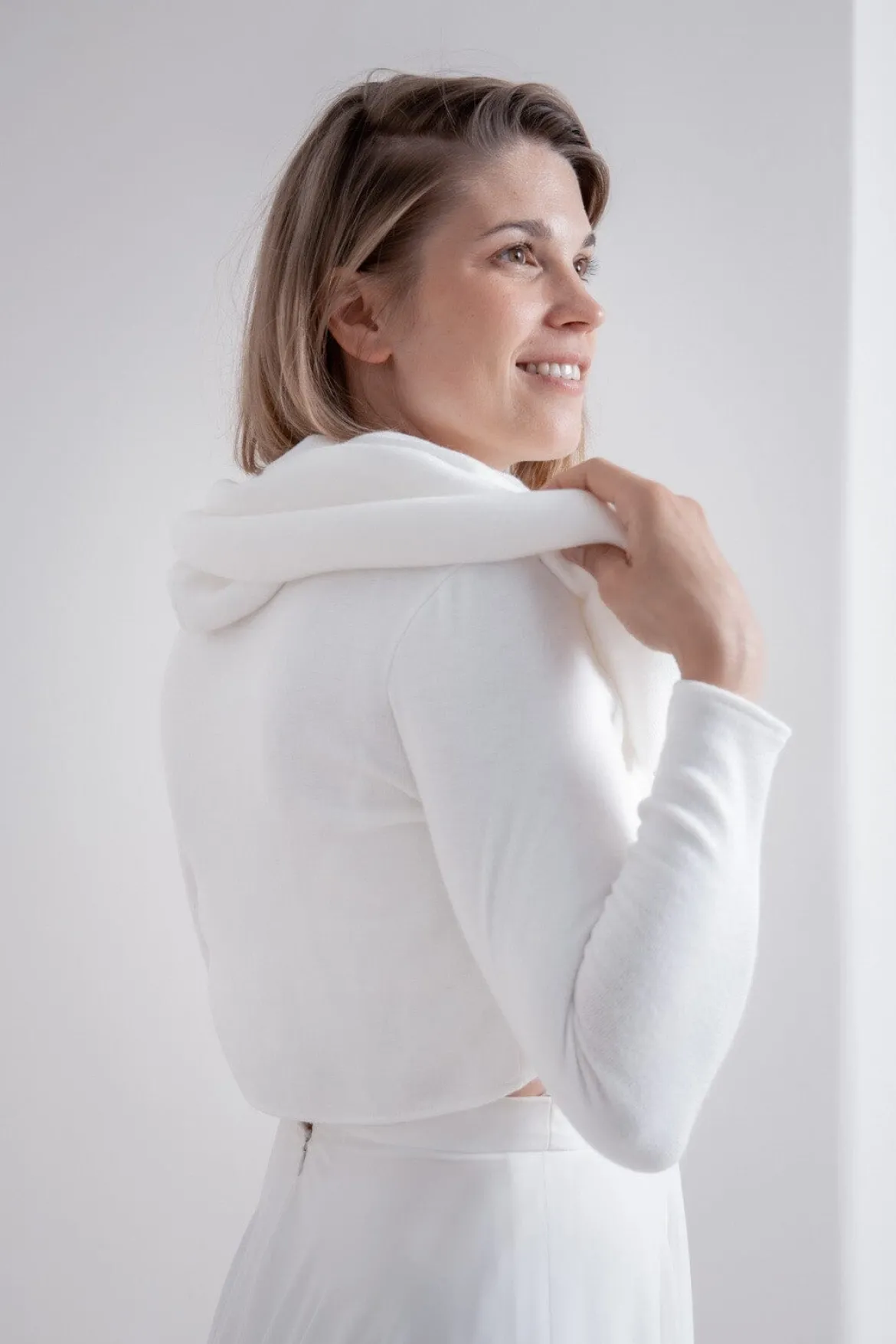 Mini-Pullover mit Perl-Knöpfen